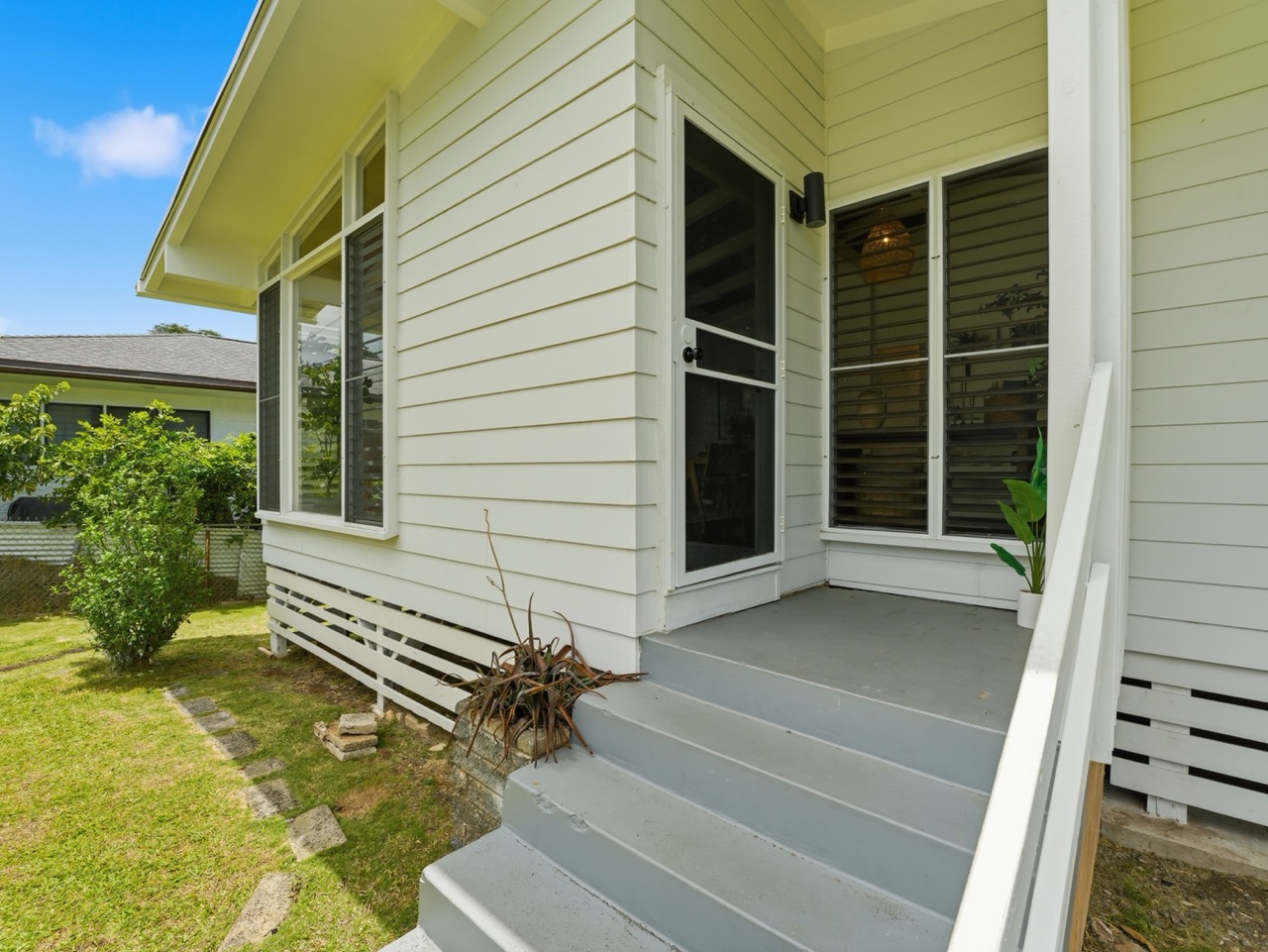 Covered front entry porch and steps