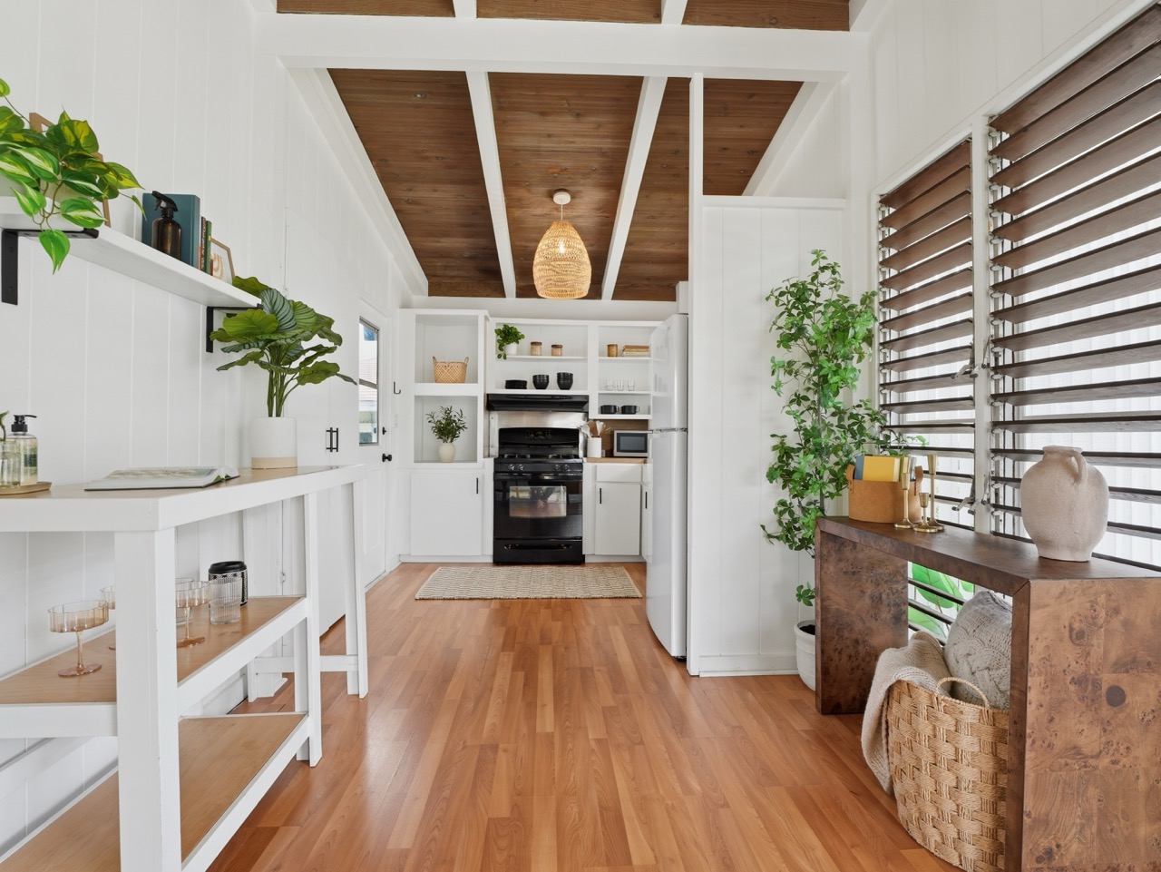 Kitchen and pantry view with hardwood floors