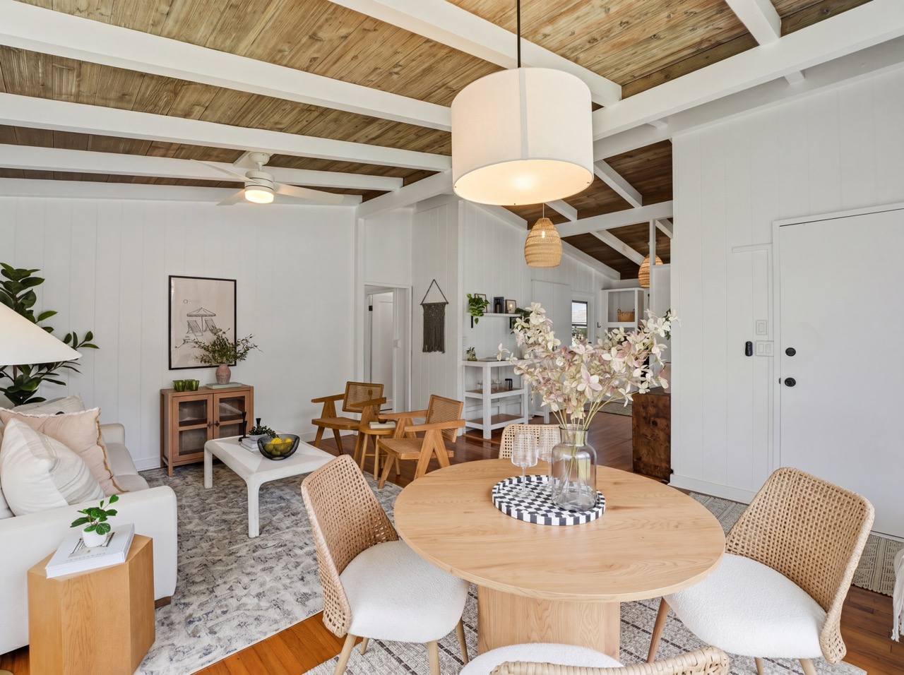 Living and dining area with rattan furniture